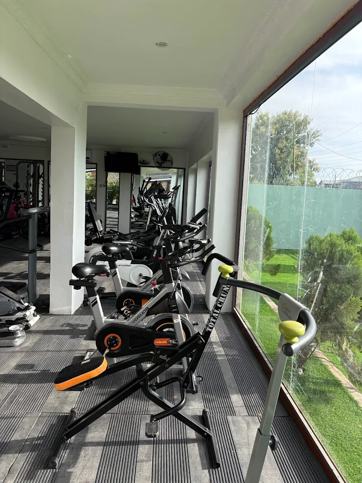 Indoor cycling bikes and cardio machines at Enoba Gym Center